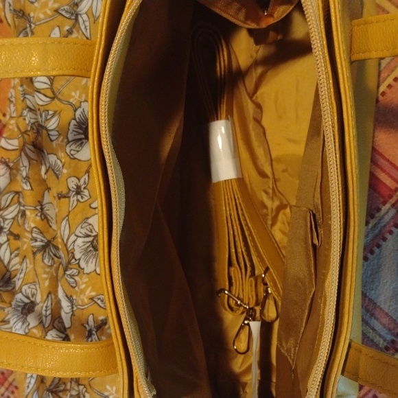 This is a new mustard colored or orange purse with matching scarf. - Picture 3 of 4
